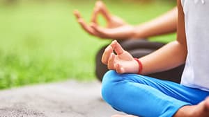 A family practicing yoga together