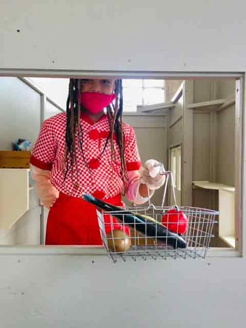 Child playing grocer